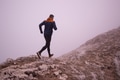 sky running or trail running woman exercising on a mountain top - PhotoDune Item for Sale