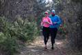 trail running with a sporty couple in the magic forest in early morning - PhotoDune Item for Sale