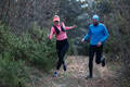 trail running with a sporty couple in the magic forest in early morning - PhotoDune Item for Sale