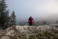Athlete couple trail running on the mountain top in the early morning. Sky running concept - PhotoDune Item for Sale