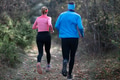 trail running with a sporty couple in the magic forest in early morning - PhotoDune Item for Sale