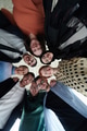 A diverse group of business professionals standing together in a powerful, united pose, captured - PhotoDune Item for Sale
