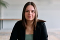A close up portrait of a young businesswoman engaged in a professional meeting, confidently - PhotoDune Item for Sale