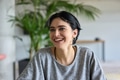 A close up portrait of a young businesswoman engaged in a professional meeting, confidently - PhotoDune Item for Sale