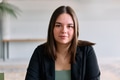 A close up portrait of a young businesswoman engaged in a professional meeting, confidently - PhotoDune Item for Sale
