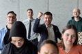 A diverse team of business professionals ecstatically celebrating their success in a modern office - PhotoDune Item for Sale