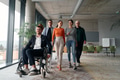A diverse group of business professionals walking together through the office, symbolizing unity and - PhotoDune Item for Sale