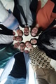 A diverse group of business professionals standing together in a powerful, united pose, captured - PhotoDune Item for Sale