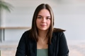 A close up portrait of a young businesswoman engaged in a professional meeting, confidently - PhotoDune Item for Sale