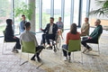 Corporate business team meeting with a manager or coach. Group of happy diverse, multiracial people - PhotoDune Item for Sale