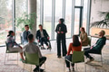 Corporate business team meeting with a manager or coach. Group of happy diverse, multiracial people - PhotoDune Item for Sale