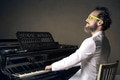 Man playing a piano - PhotoDune Item for Sale