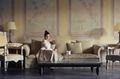 Girl sitting on a sofa - PhotoDune Item for Sale