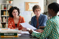 Discussing Project in Office with Diverse Team Members - PhotoDune Item for Sale