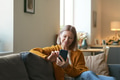 Smiling Mature Woman Using Smartphone - PhotoDune Item for Sale