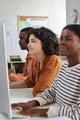 Portrait of Young Professionals Using Computer in Office Setting - PhotoDune Item for Sale