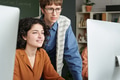 Collaborating on Computer Project in Modern Classroom Setting - PhotoDune Item for Sale