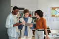 Discussing Project Details in Modern Office Setting - PhotoDune Item for Sale