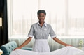 Black Woman Making Bed in Luxury Hotel - PhotoDune Item for Sale