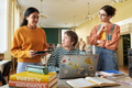 Discussing Study Plan in Cozy Library Setting - PhotoDune Item for Sale