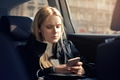 Girl using a smartphone in a car - PhotoDune Item for Sale