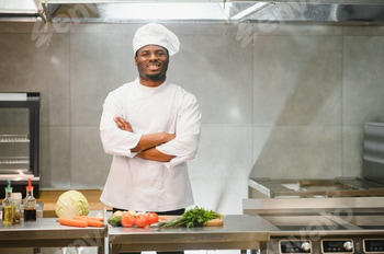 handsome african american chef at restaurant kitchen