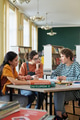 Students Collaborating in a Library for a Group Project - PhotoDune Item for Sale
