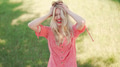 Joyful Woman Enjoying Sunny Day in Flowery Dress - PhotoDune Item for Sale