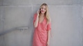 Stylish Woman in Red Dress Talking on Phone Outdoors - PhotoDune Item for Sale