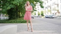 Smiling Woman on Phone Wearing Summer Dress in City - PhotoDune Item for Sale