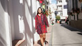 Smiling Woman Walking in Sunny Spanish Town - PhotoDune Item for Sale