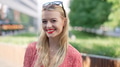 Smiling Young Woman in a Sunny Urban Park - PhotoDune Item for Sale