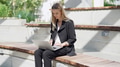Professional Woman Working Outdoors on Laptop - PhotoDune Item for Sale