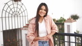 Happy Young Woman Enjoying Sunny Day on Spanish Balcony - PhotoDune Item for Sale
