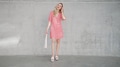Cheerful Woman in Red Dress Laughing on Phone Call - PhotoDune Item for Sale
