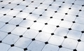 Classic white and black tile floor pattern with light shadows - PhotoDune Item for Sale
