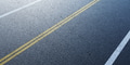 Empty road with white and yellow lane markings - PhotoDune Item for Sale