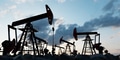 Oil pumps at sunset in a vast oil field. Oil industry - PhotoDune Item for Sale