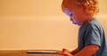 Small Baby pressing and scrolling with finger on phone touch screen. - PhotoDune Item for Sale