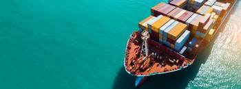 front view Cargo Container ship in the ocean ship carrying container and running for