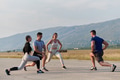 Diverse Group of Athletes Prepare Together for a Run - PhotoDune Item for Sale