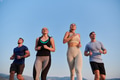 A group of friends maintains a healthy lifestyle by running outdoors on a sunny day, bonding over - PhotoDune Item for Sale